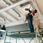 hvac contractor installing diffuser